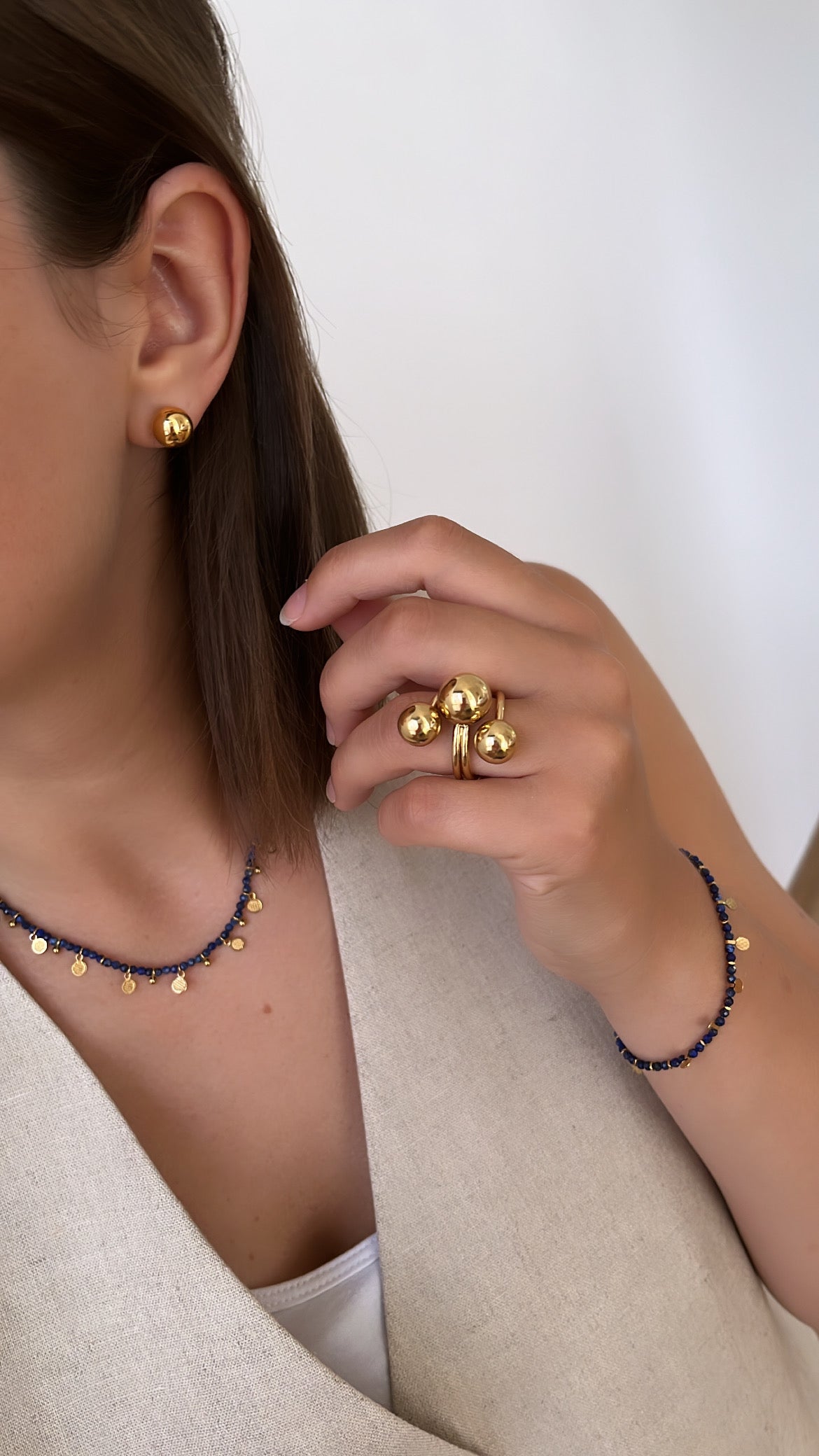 boucles d'oreilles boules dorées en acier doré