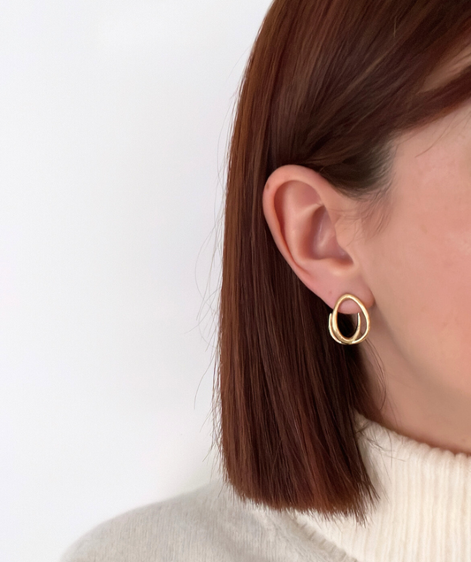 Sony - Boucles dorées entrelacées